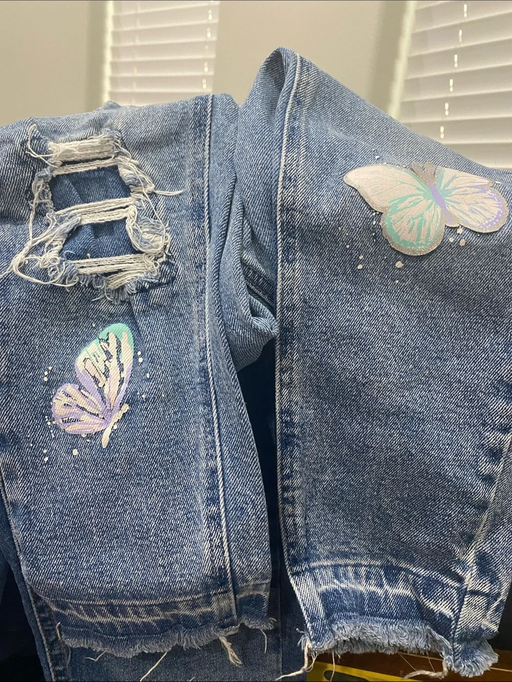 Justice Blue Denim Jeggings with Pastel Butterfly Accents